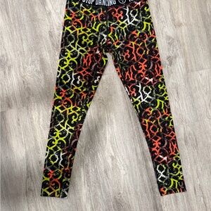 Zumba Fitness Black, Orange, and Green Patterned Leggings